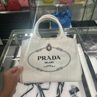 p43【美品】Gカード付 プラダ　三角ロゴ　ステッチレザーブラウンハンドバッグ. prada