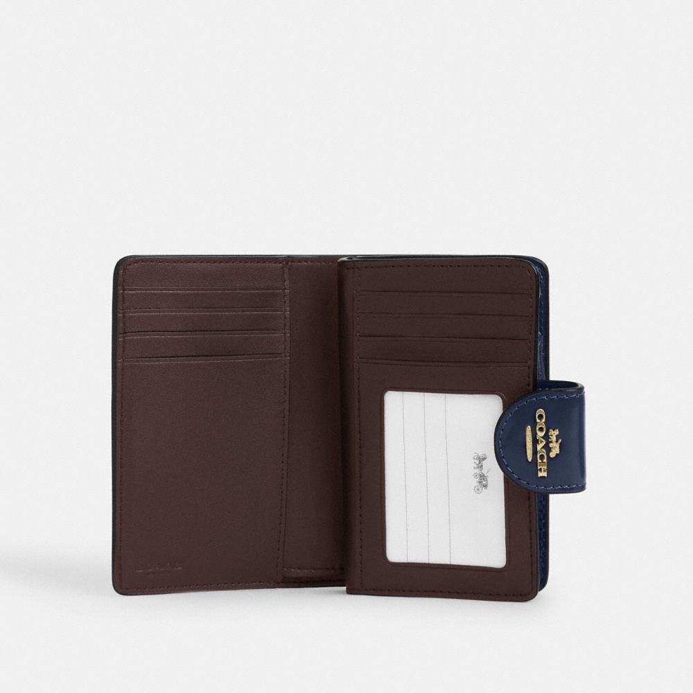 코치 체리 프린트가 있는 미디엄 코너 지퍼 지갑 CZ762 골드/트루 네이비