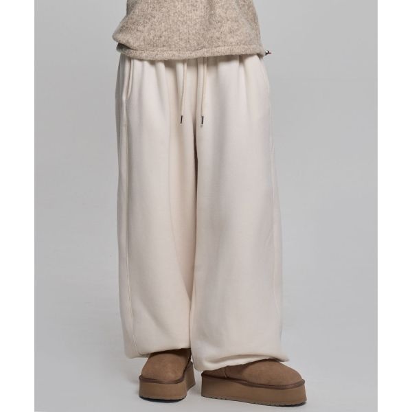 CHICKS 양기모 스웻 사이드 절개 팬츠 크림