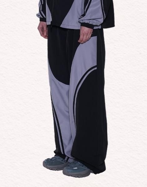 널디 NDY 커브드 블락 우븐 팬츠 블랙 PNEF23PT0201 303293