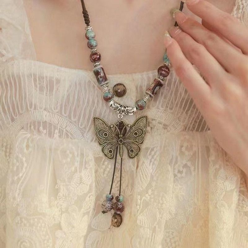 [카플스][패션플러스][홀리지]피에로 모리룩 오리엔탈 히피 나비 롱 목걸이