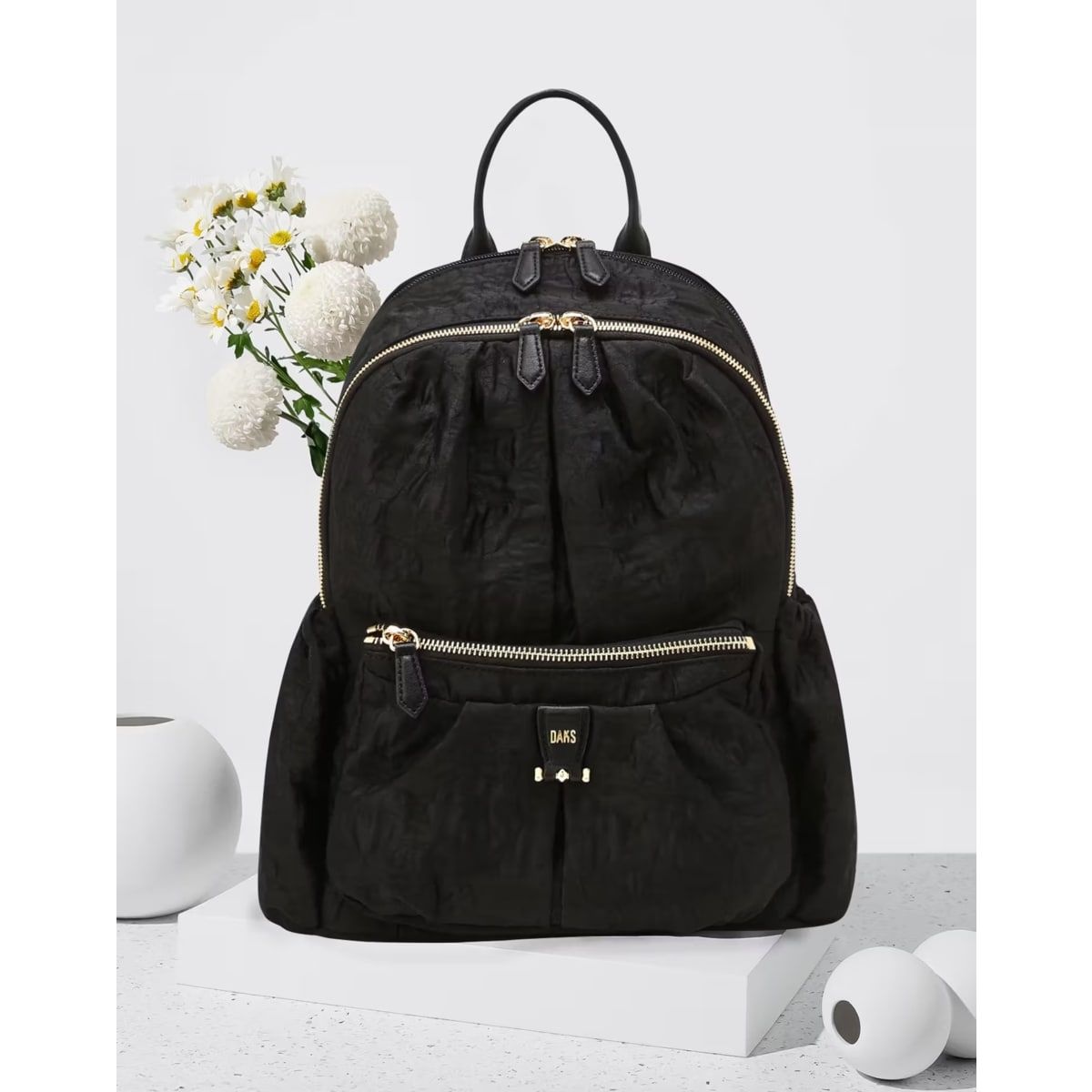 닥스 DCBA6E503BK CHELSEA 블랙 플라워 패턴 원단 백팩 479849