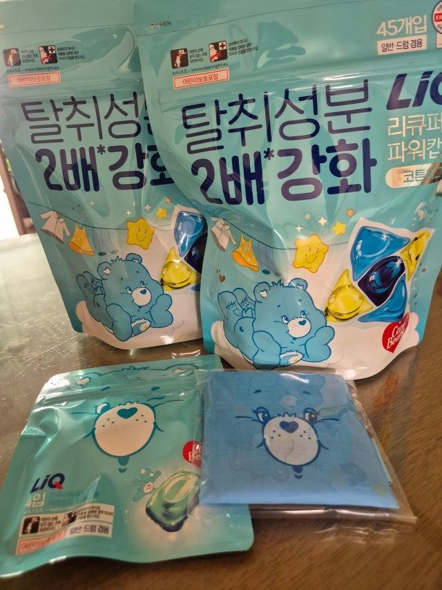 리큐 케어베어 캡슐세제 45입 2개+타포린백 퍼퓸파워 코튼허그 향기캡슐 퍼퓸캡슐