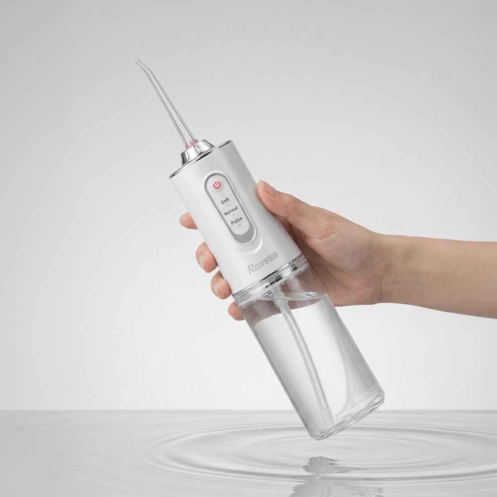 [롯데온]란센 클린픽 휴대용 구강세정기 HL18650 (9,900/무배)